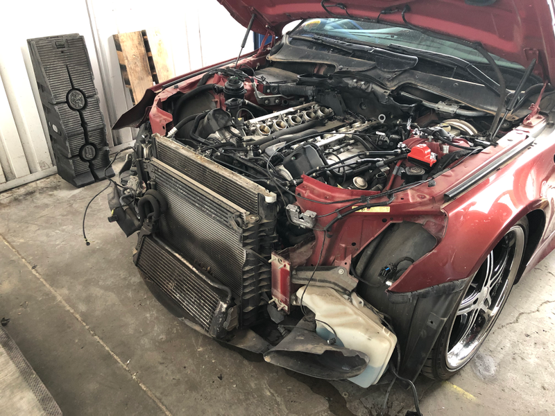 Oil cooler, AC condenser, radiator, and power steering cooler. Full-on racecar stuff here.